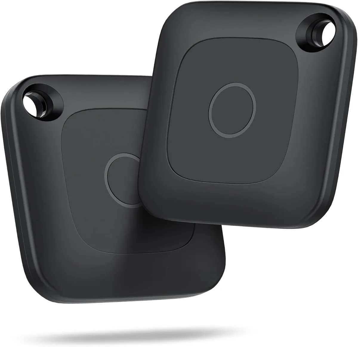 Two black Beacon Tag Bluetooth trackers photographed front and back